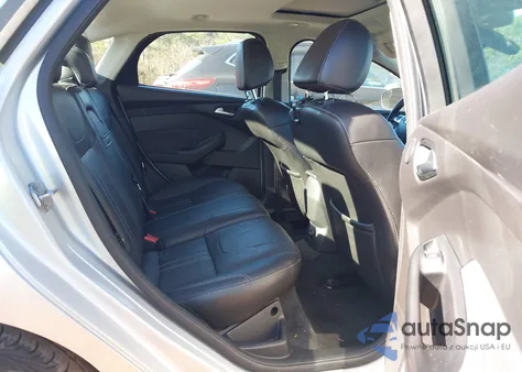 2012 Ford Focus Titanium z USA, uszkodzony, nr VIN 1FAHP3J20CL444584